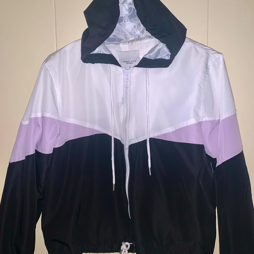 purple, white and black windbreaker